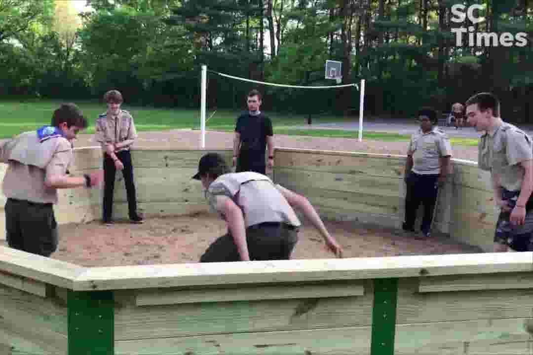 A group of 6 Scouts in a gaga ball pit