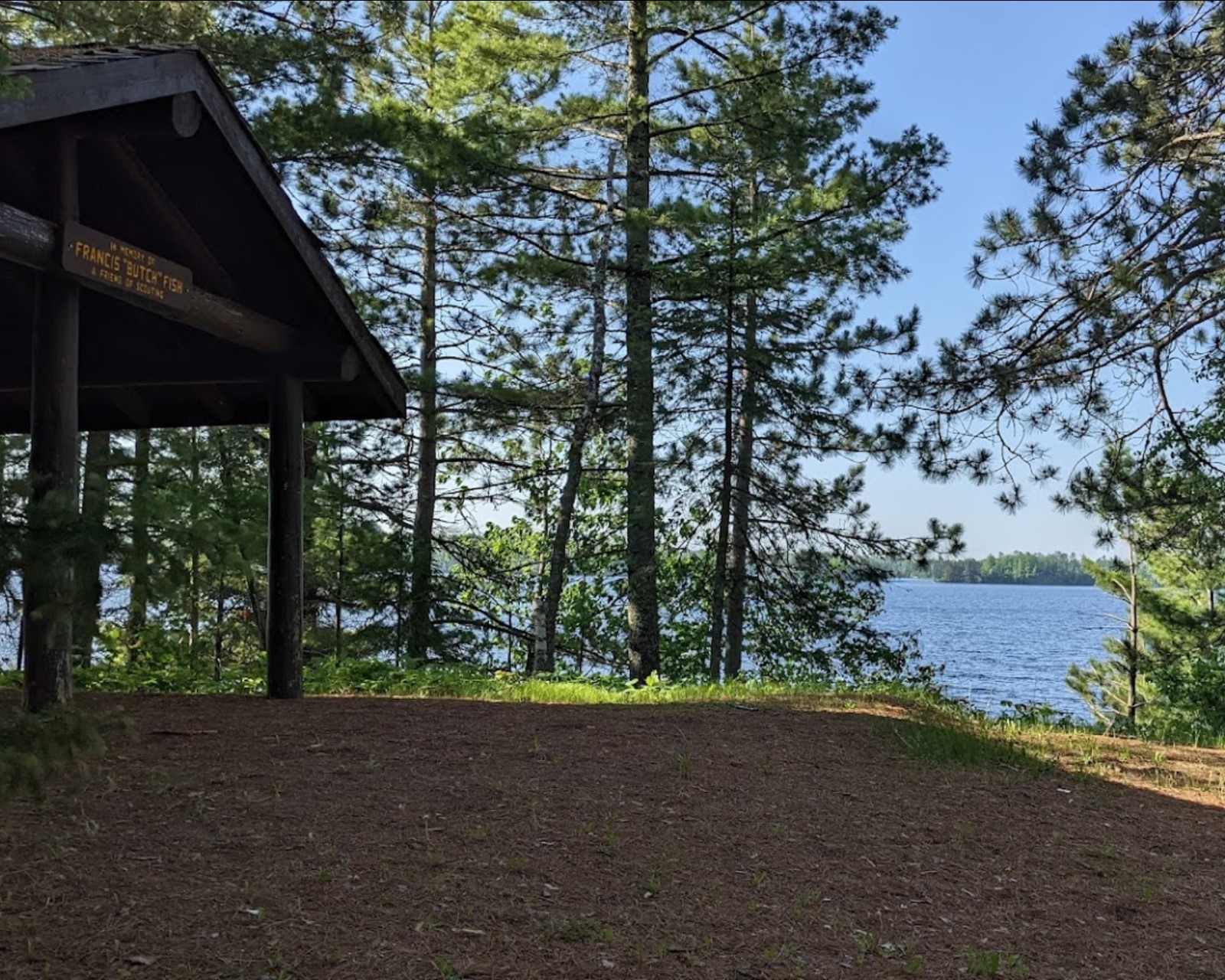 A pavilion with the lake in the background